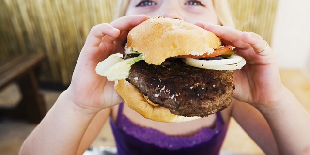 Girl Eating Hamburger