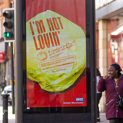 Image of the Real Picture out of home campaign. Featuring a burger with 'I'm not lovin' on the wrapper.
